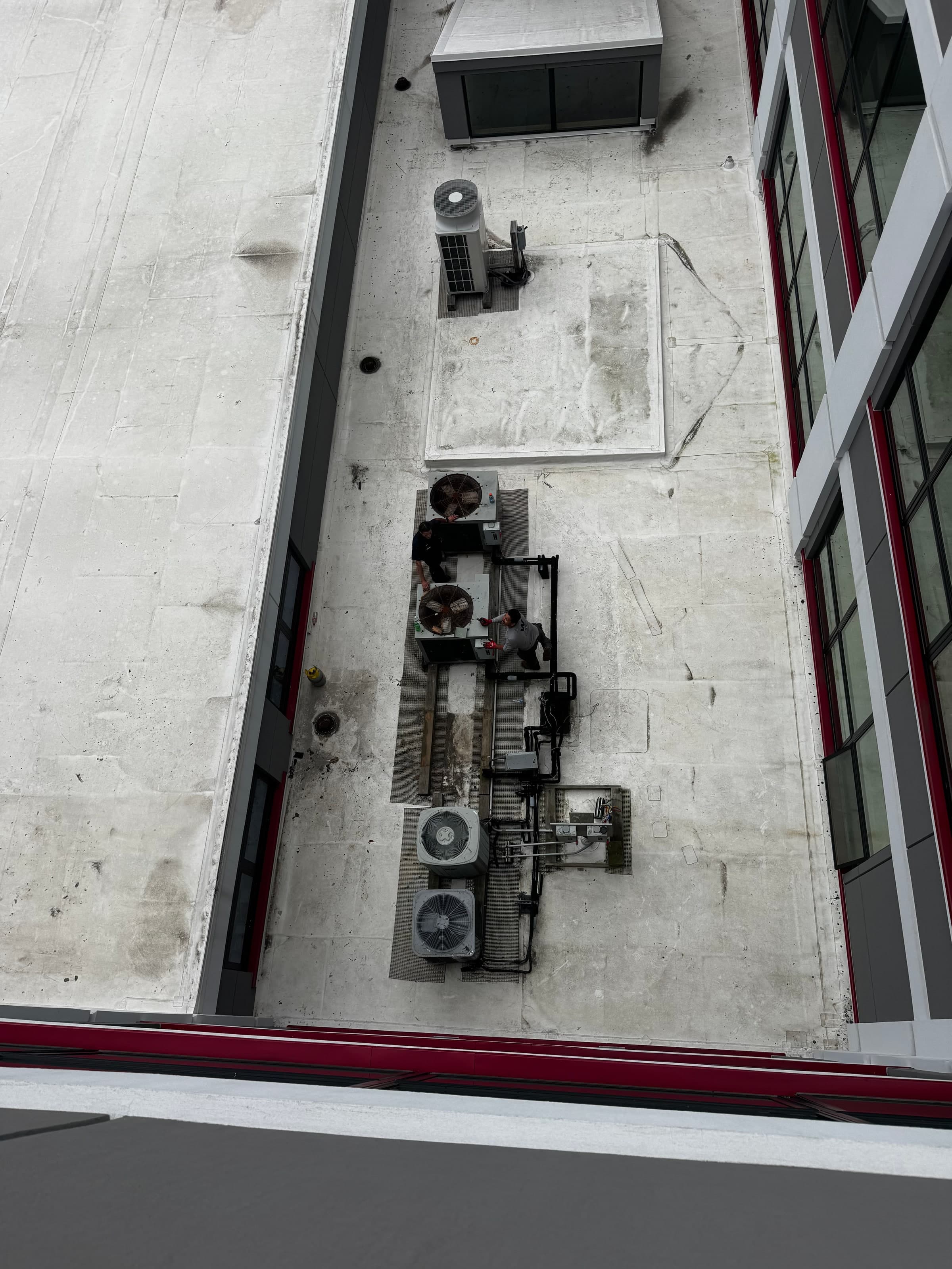 Overhead view of a Connecticut commercial rooftop heat pump installation