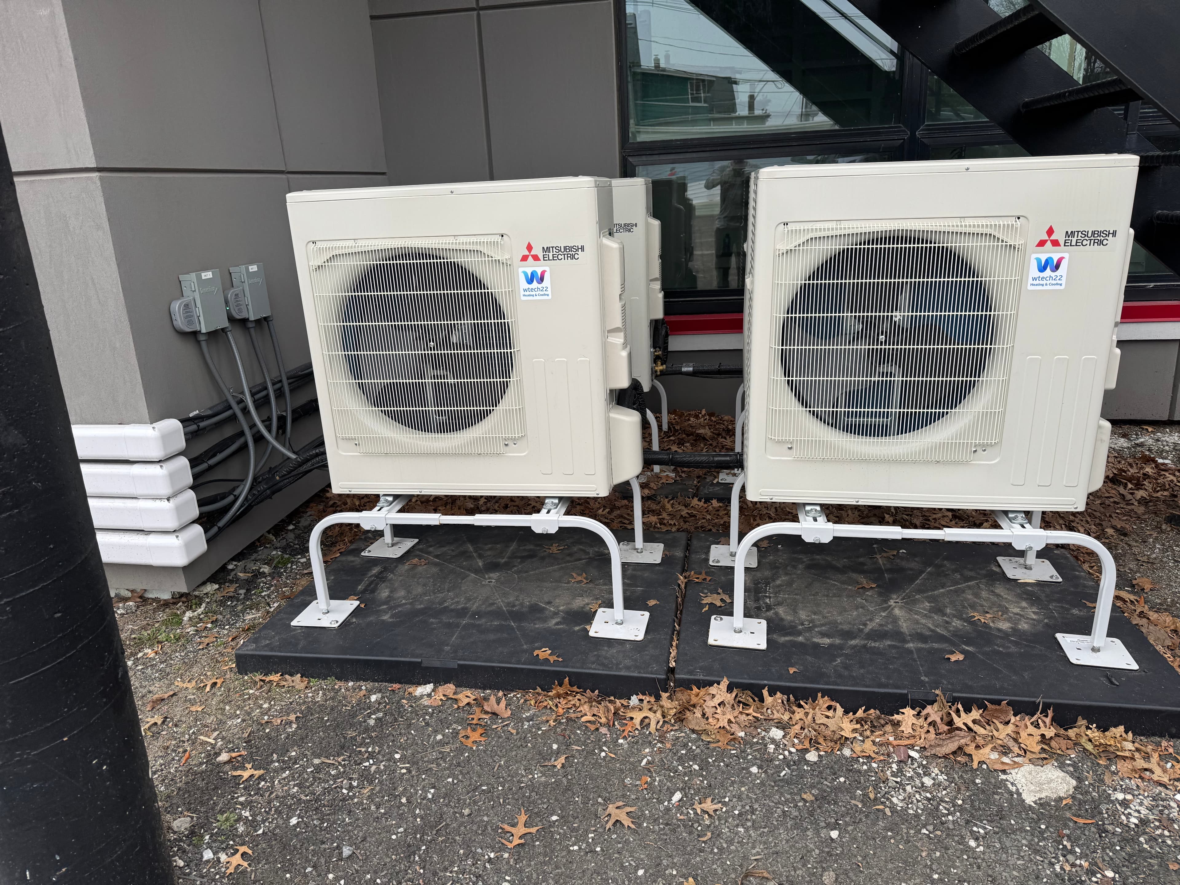 Dual-outdoor Mitsubishi heat pump installation in Connecticut for larger or multi-zone homes